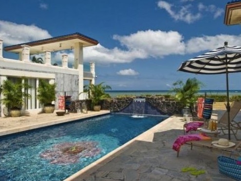 The trucking magnate’s property is on one of Honolulu’s most prestigious streets.