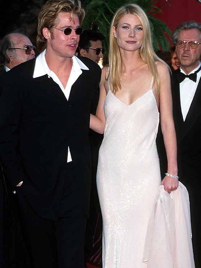 Brad Pitt with Gwyneth Paltrow, in a slip dress, in 1996. Picture: WireImage