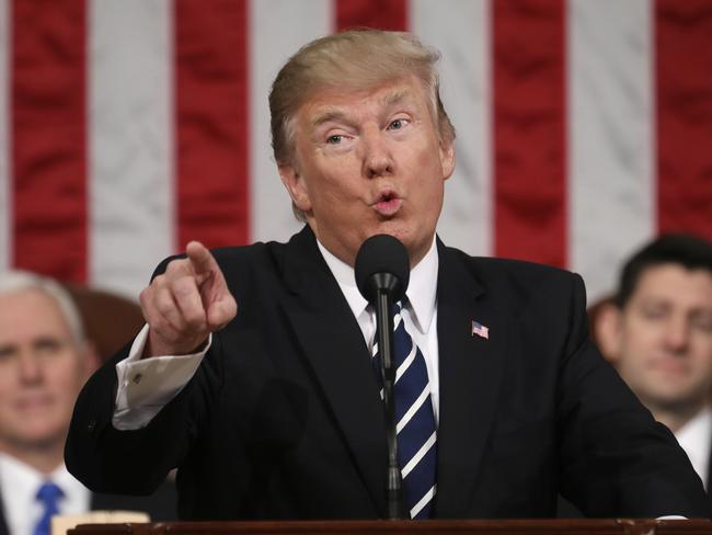 FILE - President Donald Trump addresses a joint session of Congress on Capitol Hill in Washington, Feb. 28, 2017. (Jim Lo Scalzo/Pool Image via AP, File)