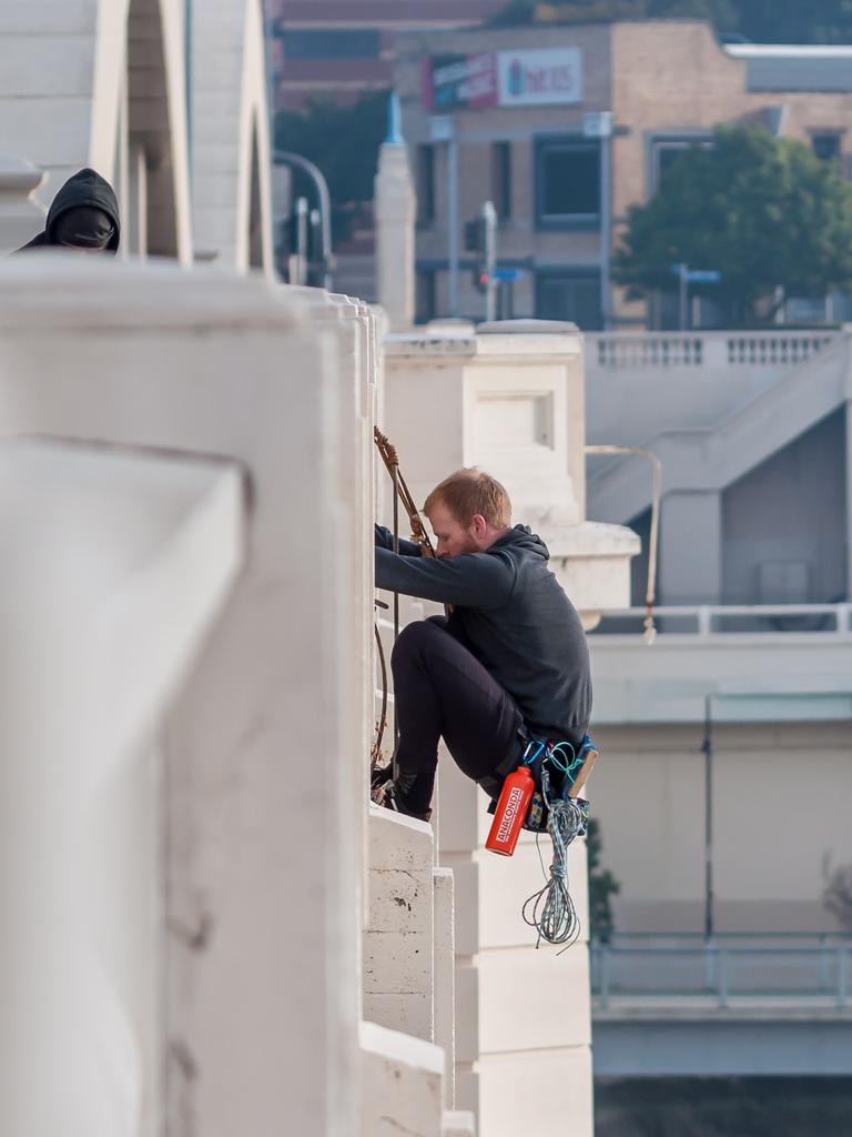 Extinction Rebellion protester abseiling William Jolly Bridge. 19 August 2019. Picture: Supplied.