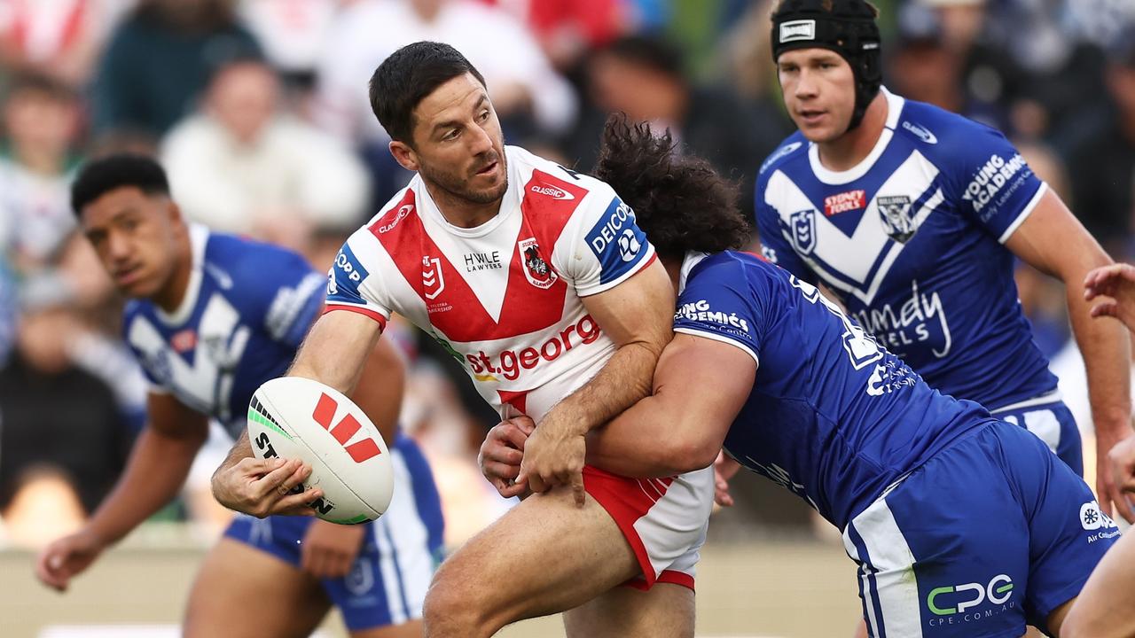 WOLLONGONG, AUSTRALIA - APRIL 30: Ben Hunt of the Dragons offloads the ball in a tackle during the round nine NRL match between St George Illawarra Dragons and Canterbury Bulldogs at WIN Stadium on April 30, 2023 in Wollongong, Australia. (Photo by Matt King/Getty Images)