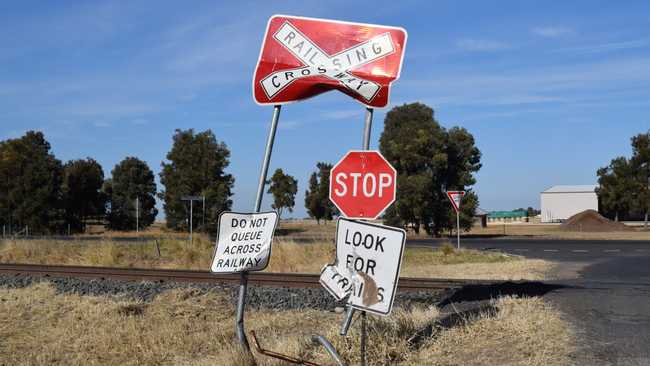 Damaged signs by the railway crossing on Dawson's Gate Rd, Chinchilla near the Warrego Highway. Picture: Madison Watt