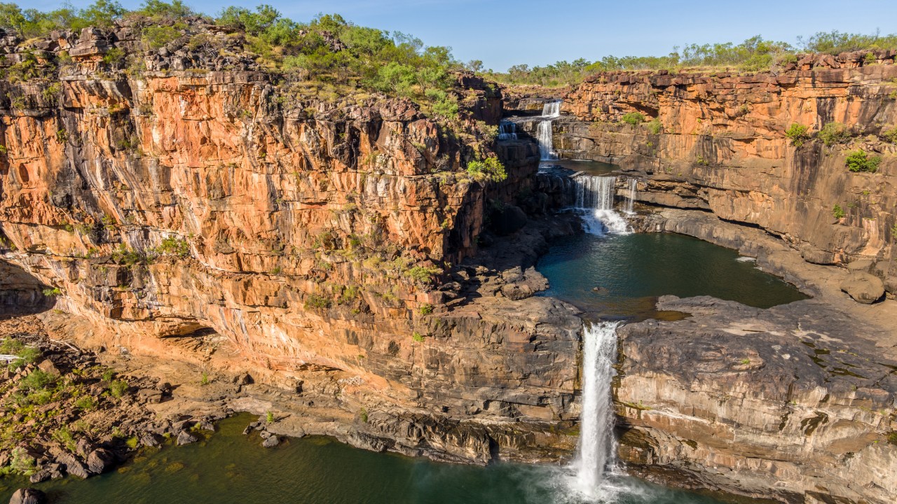 <h2><b>Talk the walk </b></h2><p><span>Hikes through Emma Gorge, up to Mitchell Falls (pictured) and in the unique Bungle Bungle Range required a reasonable level of fitness but the pace was set to suit the least active. It provided every opportunity to engage with fellow travellers, compare experiences, tell travel tales and Insta-brag photos at the wilderness lodge that evening. My tour party of 19 soon had a WhatsApp group going, so if I missed the photo of the day (crocs pose motionless but soaring sea eagles don&rsquo;t) someone else had probably captured the moment. </span></p>