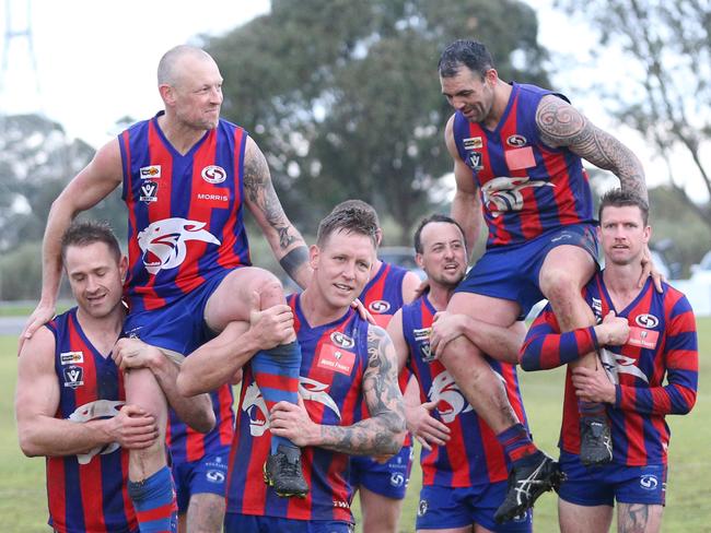 Foootball GDFL: Bell Post Hill v Geelong West.Bell Post Hill 300 games player Travis Fursland and 200 games player Tim Barton are carried off by team matesPicture: Mark Wilson