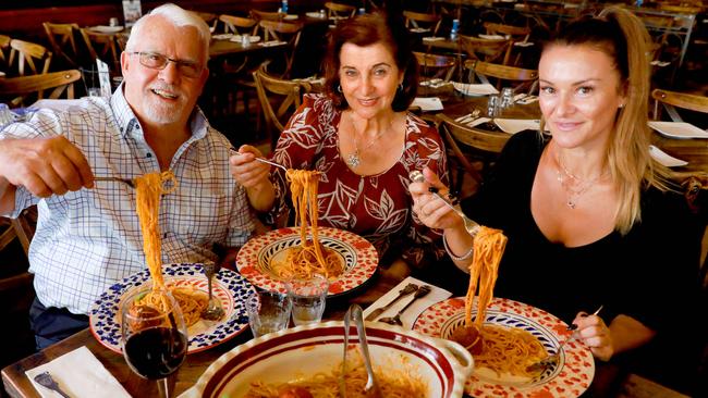 Cosmo, Rosa and daughter Kathy Criniti pose for photographs at Criniti's in Parramatta. Picture: AAP IMAGE/Angelo Velardo