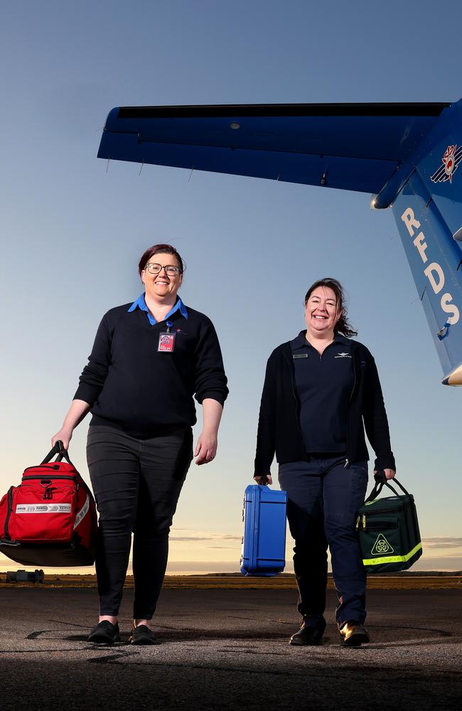 The admirable work of the Royal Flying Doctor Service — Jackie Hanniver and Carol Doyle pictured — is not a viable alternative to having adequate specialist health services available in Australia’s vast regional areas. Picture: Toby Zerna