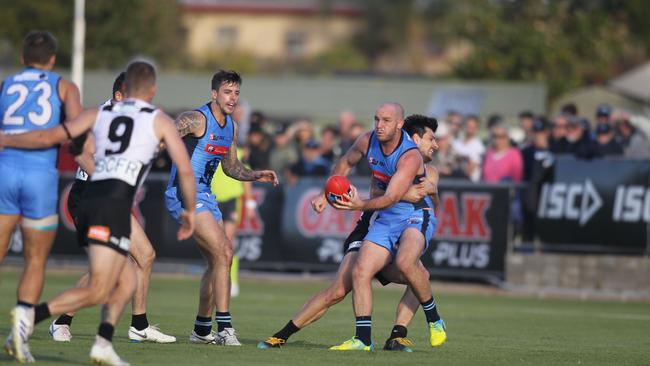 Zane Kirkwood and his Sturt mates were under pressure all day in front of big crowd at Alberton Oval. Picture: Dean Martin/AAP