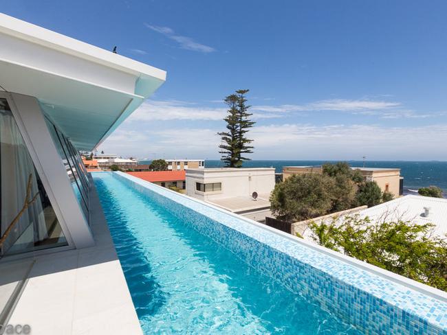 The contemporary beach pad in Cottesloe has two swimming pools.