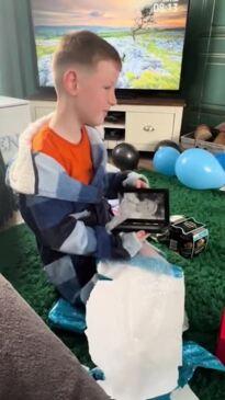 Boy bursts into tears after receiving emotional birthday gift