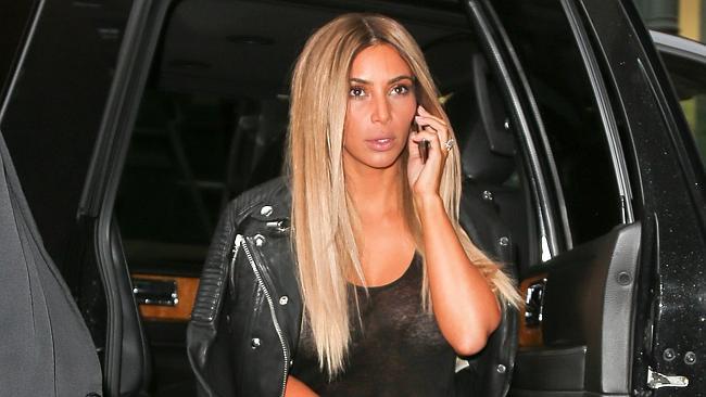 Hitting the town: Kim Kardashian knows blondes have more fun.