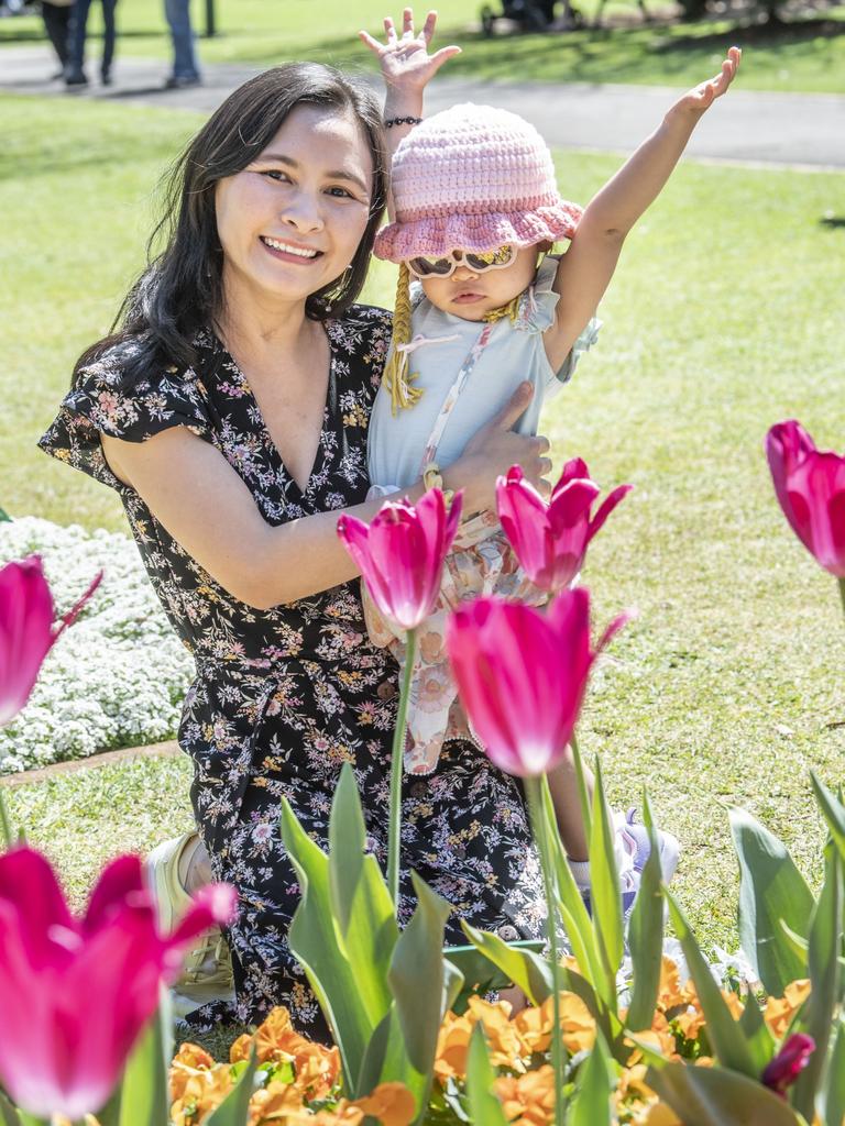 Thy Le and Sophie Le admire the tulips in Queens Park. Sunday, September 18, 2022. Picture: Nev Madsen.