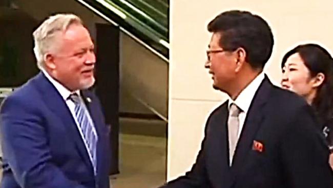 Swedish envoy Kent Harstedt greets a North Korean official. Picture: Nine News