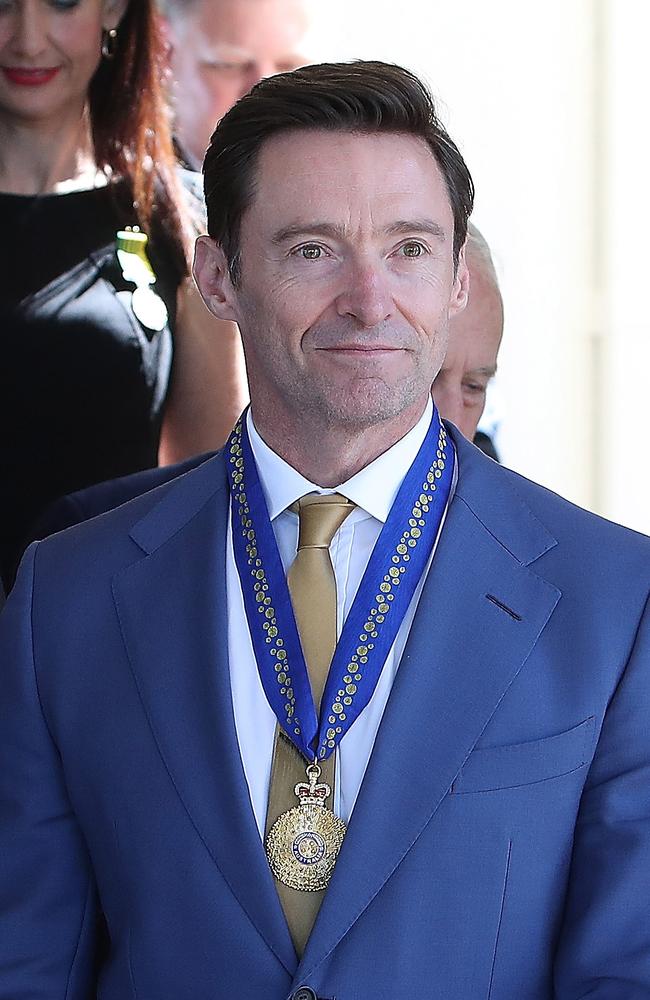 Hugh Jackman being appointed a Companion in the General Division by the Governor-general David Hurley, during investiture ceremony at Government House in Canberra. Picture: Kym Smith