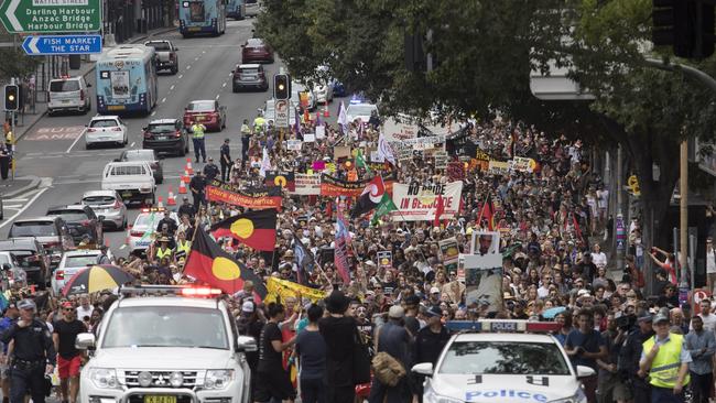 Thousands take to the streets to protest Australia Day on January 26, 2018 in Sydney, Australia. Picture: Cole Bennetts/Getty Images.
