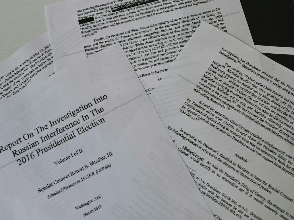 An illustration shows printed pages of the Mueller Report. Picture: AFP