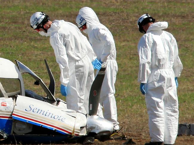 *NOTE BODY VISIBLE IN PLANE* The site of a plane crash, east of the Hume Freeway outside Avenel. Police are currently in Mangalore following an aircraft collision this morning.Emergency services were called to two separate crash scenes east of the Mangalore airfield about 11.25am.It is believed two aircraft have collided mid-air before crashing.Two occupants in each aircraft have died at the scenes. Picture: Mark Stewart