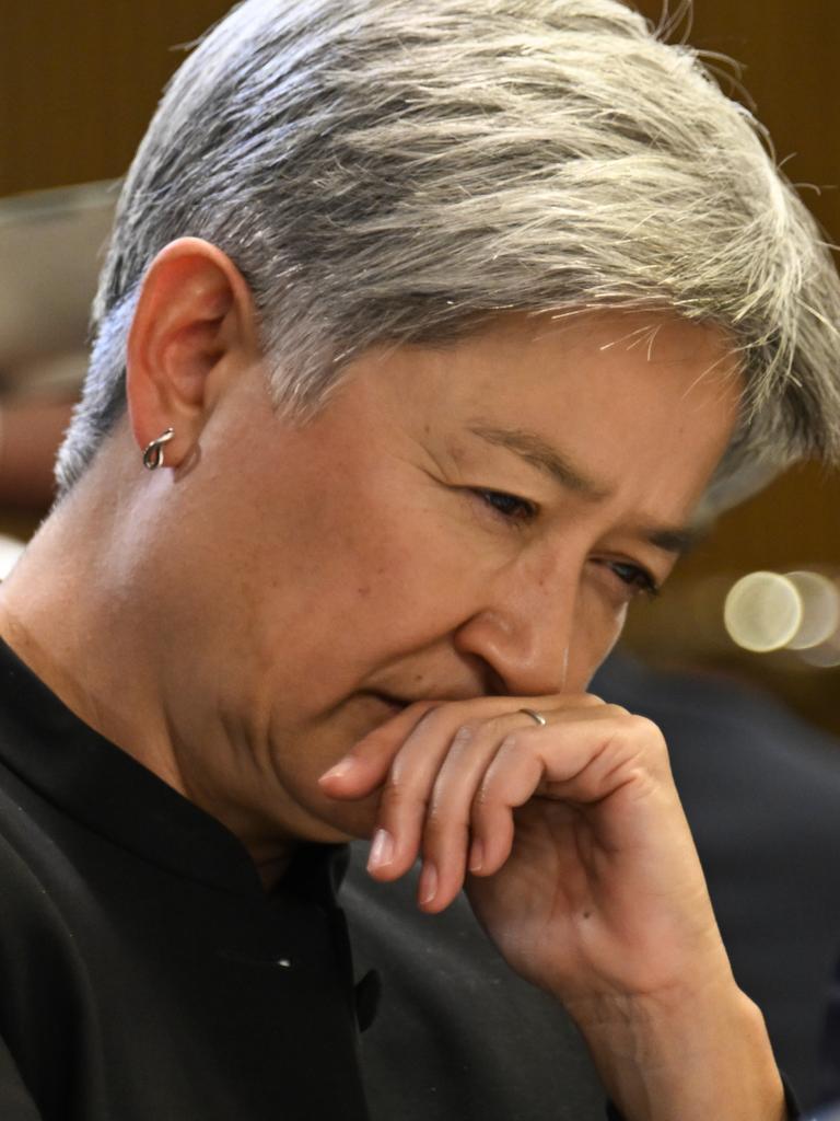 Foreign Minister Penny Wong listens to Anthony Albanese at the National Press Club. Picture: NewsWire / Martin Ollman