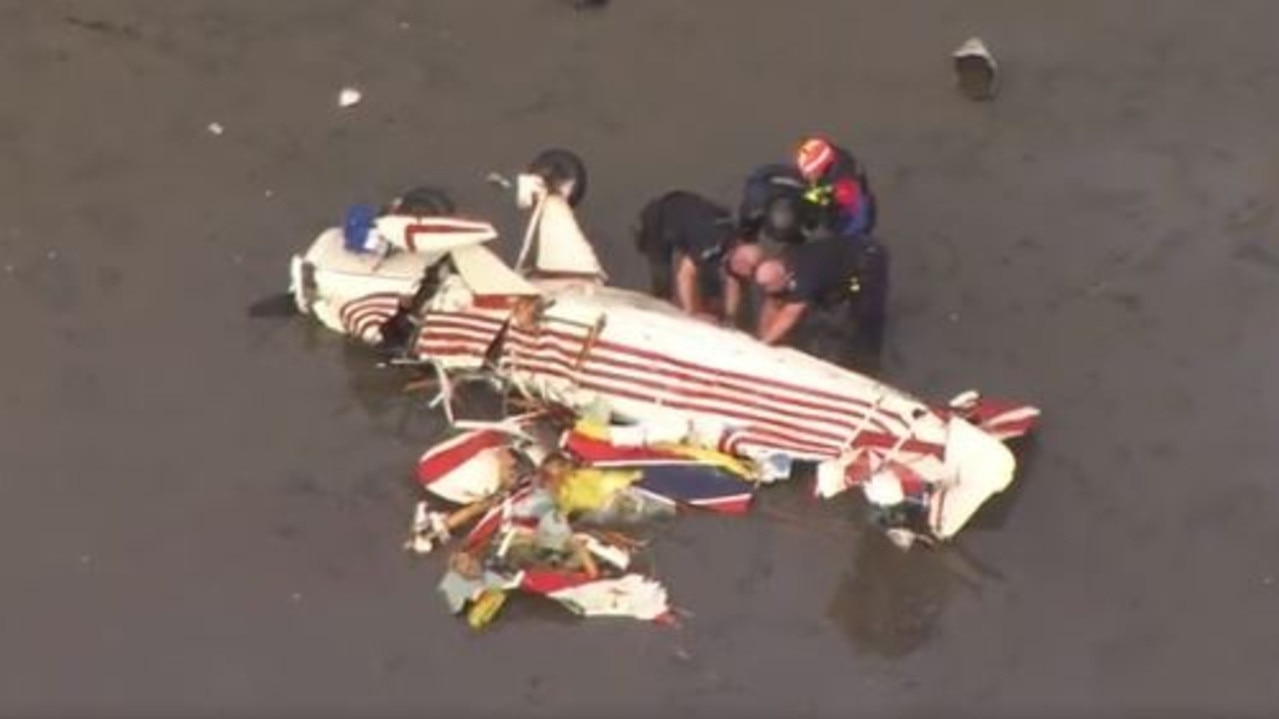 Emergency crews on the scene of a plane crash off Bribie Island in August. Picture: 7NEWS Brisbane