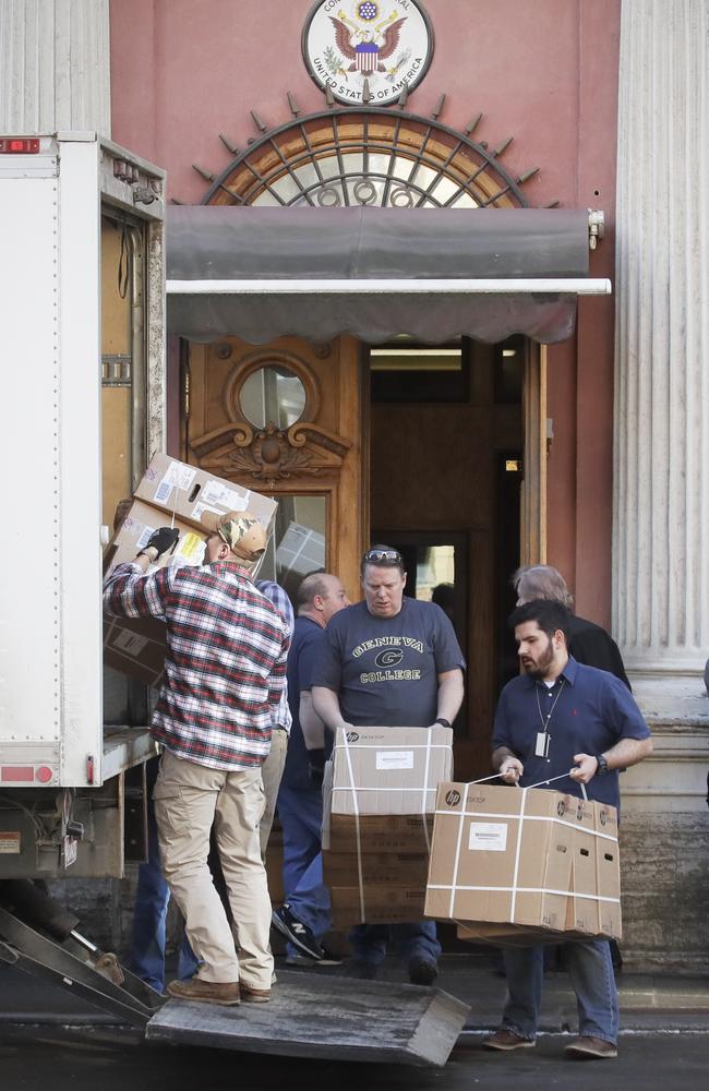 Goods are loaded onto a truck outside the US consulate in St. Petersburg, Russia. Picture: AP