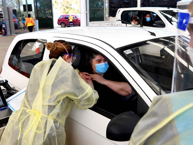 A Melbourne resident receives a dose of the Pfizer Covid-19 vaccine. Picture: AFP.