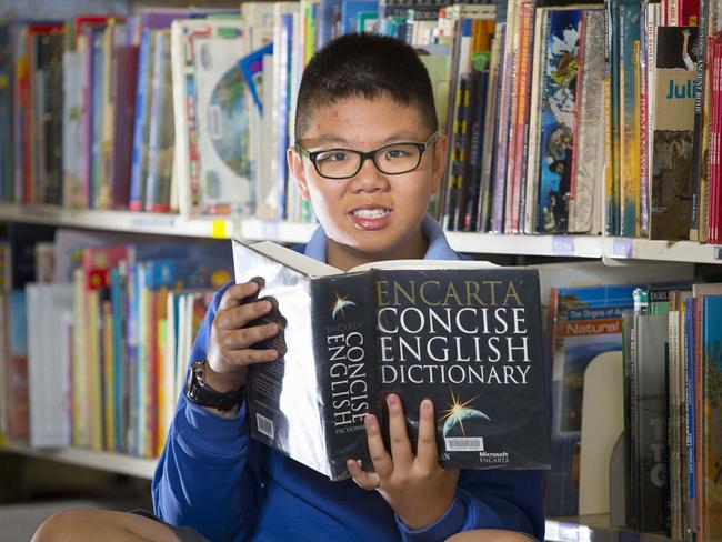 Fairfield Advance - Alex Nguyen (11, pictured) is a finalist in the NSW Premier's Spelling Bee, Senior Division 2015.  All photographs taken at his school, St Johns Park Public School, Sandringham Street, St Johns Park NSW Australia