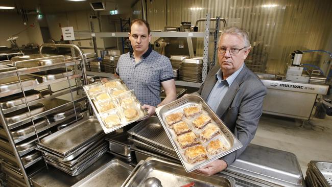 I Cook owner Ian Cook (R) and son Ben Cook in the kitchen of their defunct business. Picture: David Caird