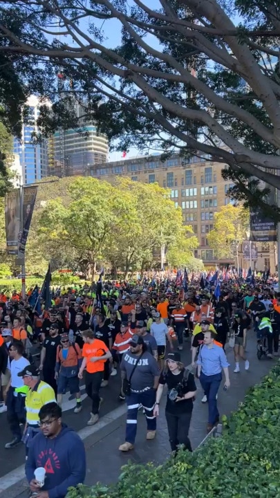 Thousands of workers of the CFMEU march in protest around Sydney