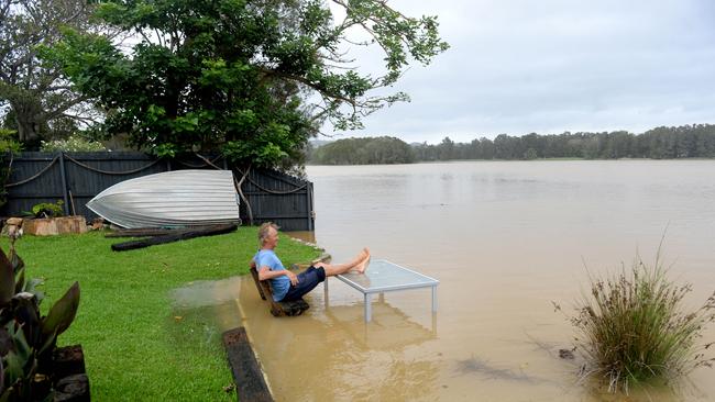 Narrabeen local Rohan Cudmore wakes to see the water levels rise and flood his back yard in Lagoon St, Narrabeen, in December 2020. Picture: Jeremy Piper