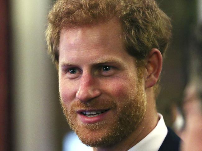 Prince Harry speaks to guests during the Queen's Young Leaders Awards Dinner, at Australia House in central London following an awards ceremony and reception at Buckingham Palace., Thursday June 29, 2017. (Aaron Chown/Pool Photo via AP)