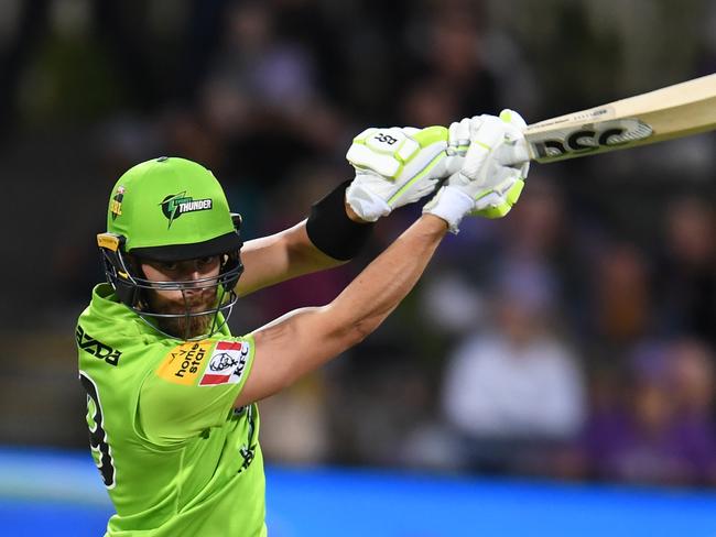 HOBART, AUSTRALIA - JANUARY 24: Alex Ross of the Thunder  plays a shot during the Big Bash League match between the Hobart Hurricanes and the Sydney Thunder at Blundstone Arena on January 24, 2020 in Hobart, Australia. (Photo by Steve Bell/Getty Images)