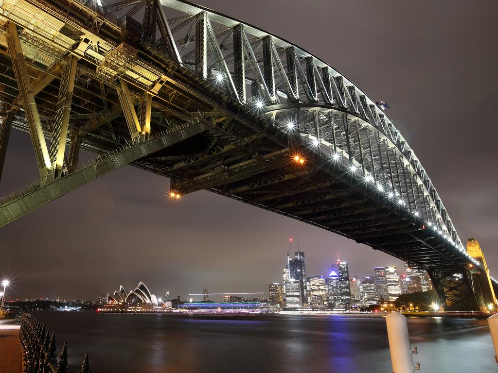 Storm clouds over the Sydney CBD and behind the Sydney Harbour Bridge pictured from Milsons Pont, Sydney, 14th March, 2019. Picture: Damian Shaw