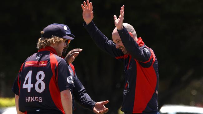 Michael McKenna of Malvern celebrates after taking the wicket of Ben Robinson. Picture: Hamish Blair