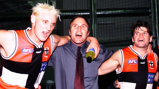 Everitt celebrating a win in 2000 with Tim Watson and Robert Harvey.