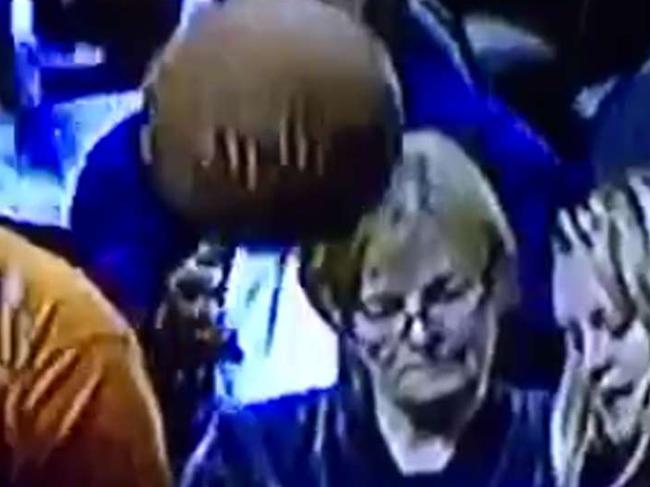 Woman wiped out by wild NBA pass