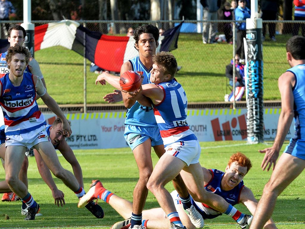 SANFL Sturt v Centrals at Elizabeth.Sturt’s McAdam gets the ball away under pressure.