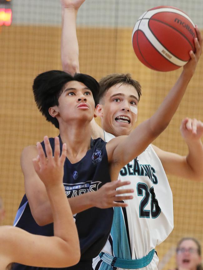 Basketball Queensland Under-16 Boys State Championships at the Coomera Indoor Sports Centre.Northside Wizards v North Gold Coast Seahawks .Wizards Tyrone Guce beats Seahawks Aldo Van Deventer. Picture Glenn Hampson