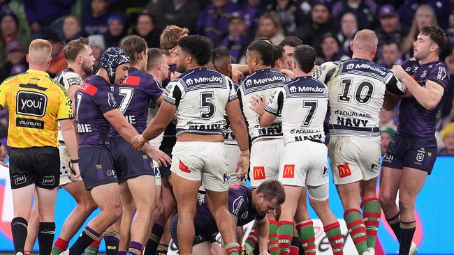 Cameron Munster of the Storm reacts as teammates rush in to confront Taane Milne. Photo by Daniel Pockett/Getty Images.