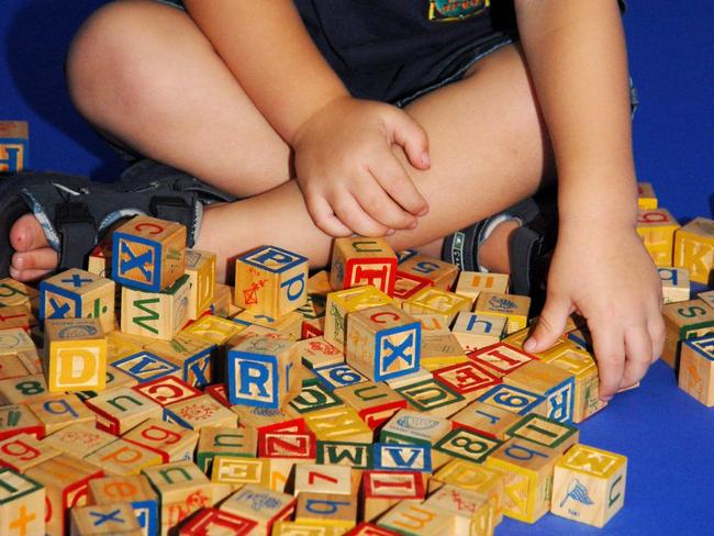 21 Jan 2007 Lachlan Hood 3yrs playing with building blocks : PicPaul/Riley - child children plays game block alphabet learning read letters abc letter toddler education prepatory child care spelling generic