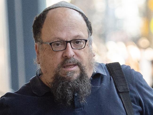 MELBOURNE AUSTRALIA - Newswire Photos AUGUST 15TH : Zev Serebryanski (left), arrives at Melbourne Magistrates Court for a committal hearing, after being arrested in New York and charged over the alleged sexual abuse of prominent child sexual abuse in Jewish ultra-orthodox communities advocate Manny Waks.  PICTURE : Newswire / Nicki Connolly