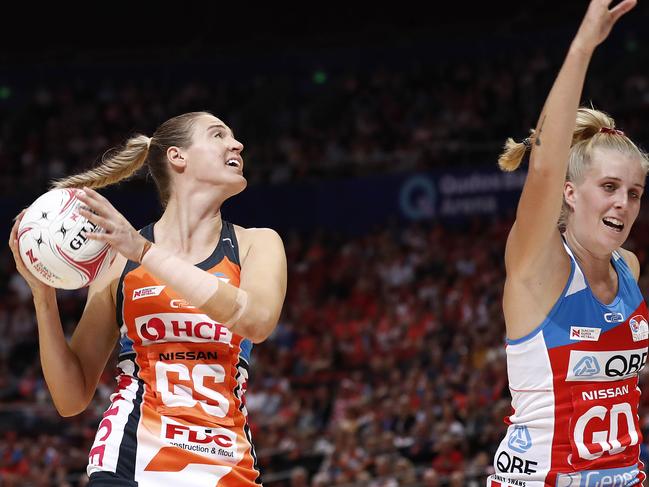 SYDNEY, AUSTRALIA - APRIL 28: Caitlin Bassett of the Giants catches the ball during the Round 1 Super Netball match between the Giants Netball and NSW Swifts at Qudos Bank Arena on April 28, 2019 in Sydney, Australia. (Photo by Ryan Pierse/Getty Images)