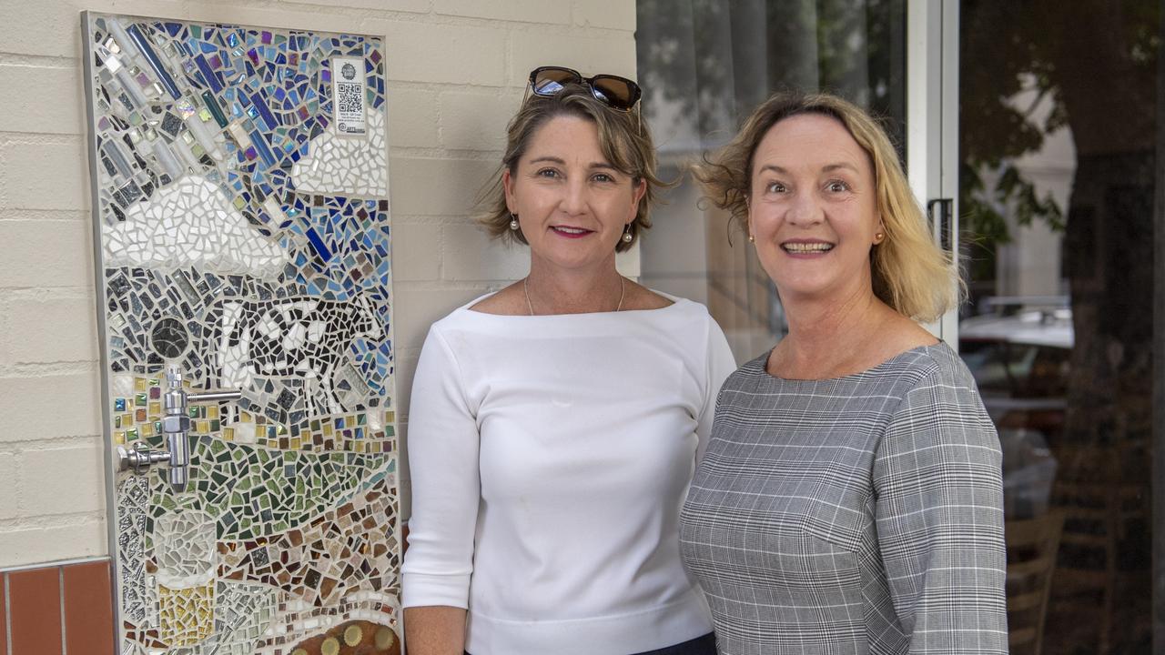 NATIONAL RECOGNITION: The Toowoomba Arts Council’s Splashing Back project has received a nomination in a national street art competiton. Arts Council president Mary-Kate Thomson (left) and Kim Besley Scott with Mary-Kate's work outside the Spotted Cow Hotel. Picture: Nev Madsen