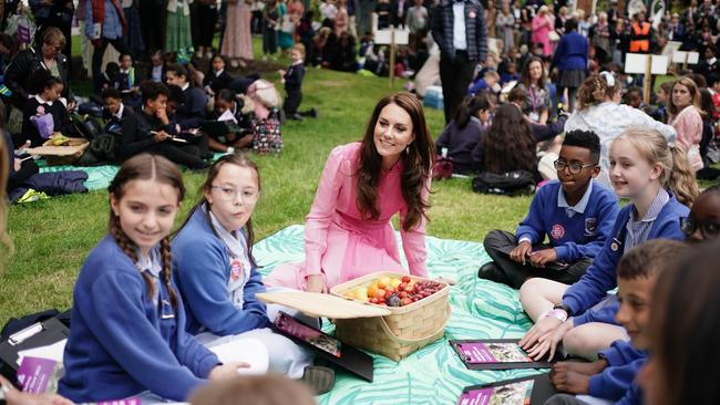 She sat with the children and answered their questions. Picture: Jordan Pettitt-WPA Pool/Getty Images