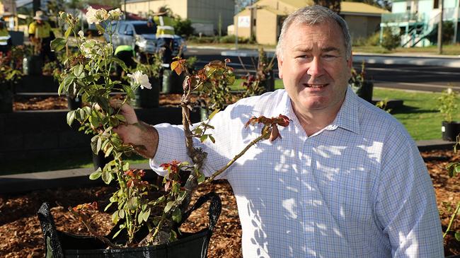 Mayor Jack Dempsey in Gin Gin for the replanting of the streetscape roses.