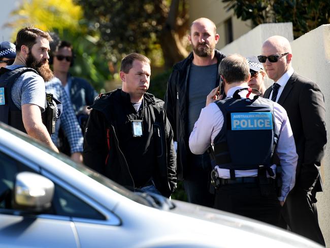 Police gather at the Dover Heights home of Kings Cross identity John Ibrahim during a series of dawn raids carried out on August 8. Picture: AAP