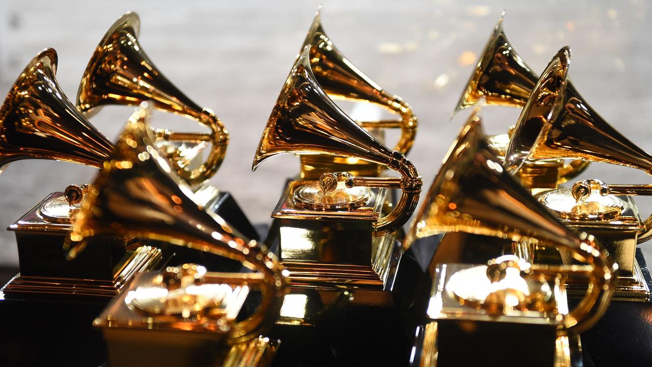 (FILES) In this file photo taken on January 28, 2018 Grammy trophies sit in the press room during the 60th Annual Grammy Awards in New York. - The organization behind the Grammys on January 5, 2022 postponed the music awards gala scheduled for January 31 due to "uncertainty surrounding the Omicron variant" that's ripped through the United States in recent weeks. (Photo by Don EMMERT / AFP)
