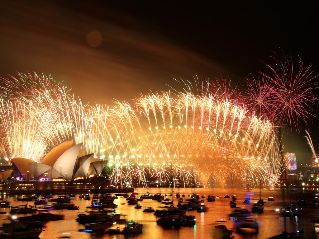 New Year's Eve midnight fireworks over Sydney Harbour as seen from Mrs Macquarie's Chair. Picture: Jonathan Ng