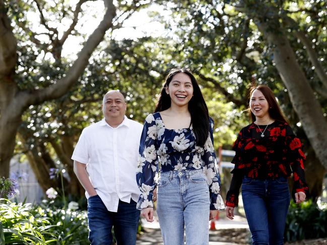 (L to R) Eric Gernan with daughter Angela and wife Mabel who are set to become Australian citizens on January 26 in North Sydney, Tuesday, 12 January, 2021. Picture: Nikki Short