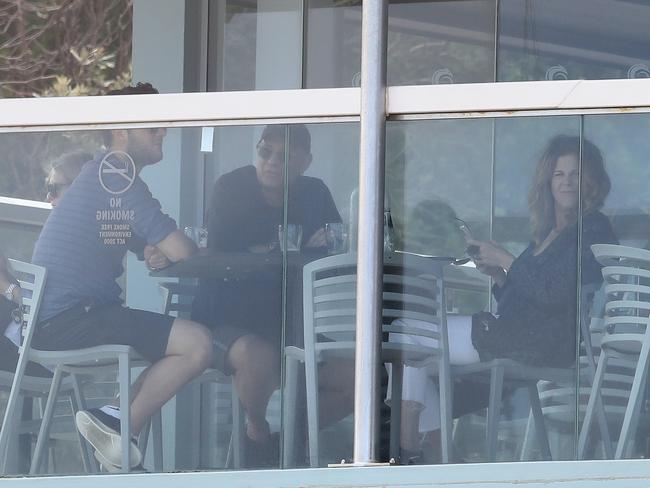 Tom Hanks, his wife Rita Wilson and their son enjoy beer at Bondi RSL after doing the coastal walk in Sydney recently. Picture: KHAPGG/BACKGRID