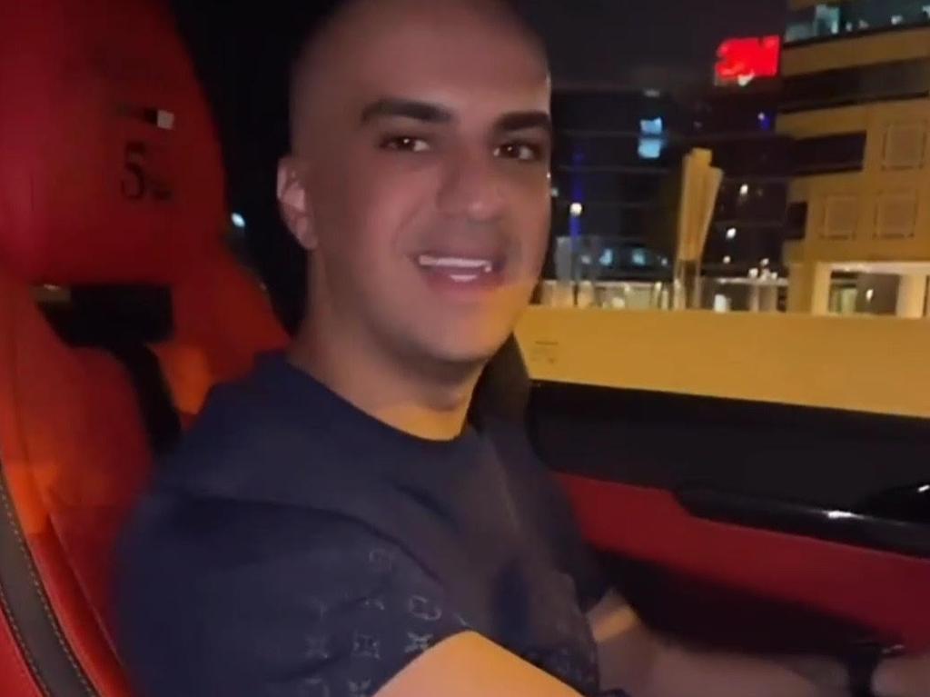 Ahmed Al-Hamza smiling at the wheel of a luxury Lamborghini sports car in Dubai. Picture: Supplied