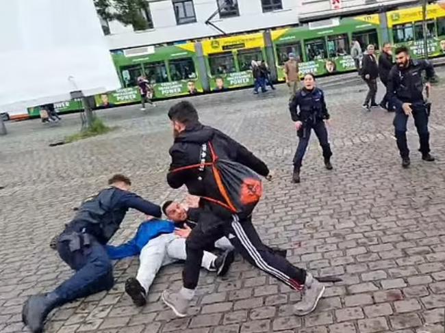 Screengrabs from the YouTube livestream shows the attack at the BPE rally in Mannheim. Picture: Supplied